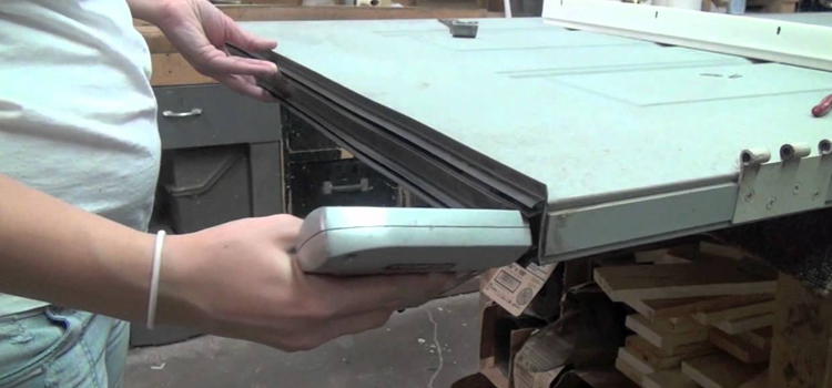 damaged steel door repair Ensley